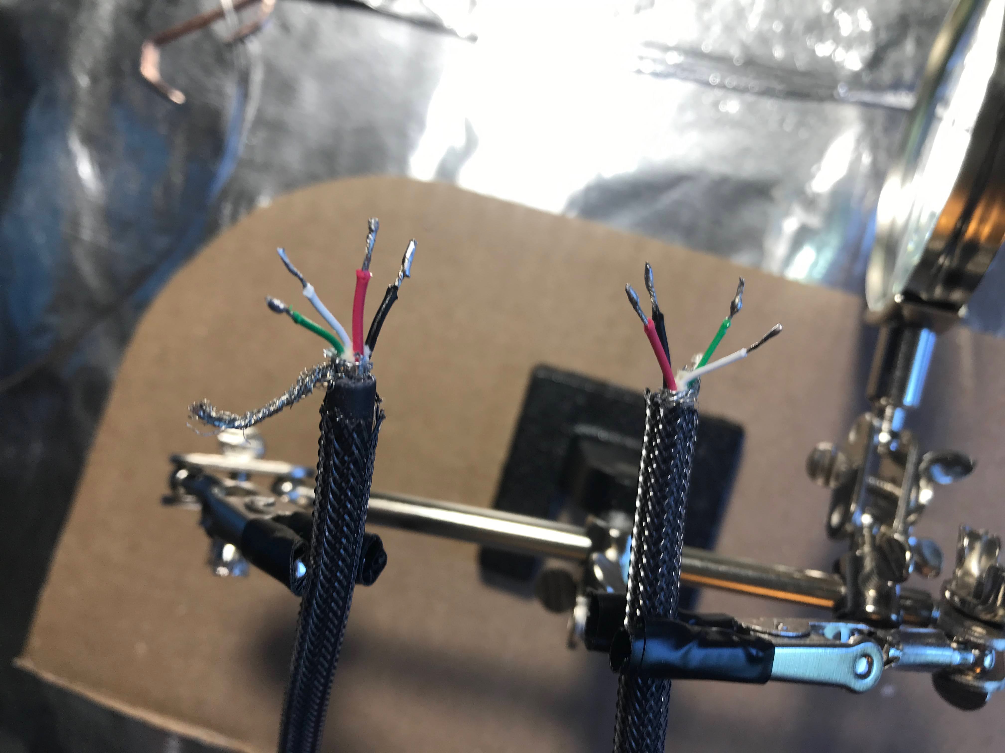 Stripped USB cable conductors
